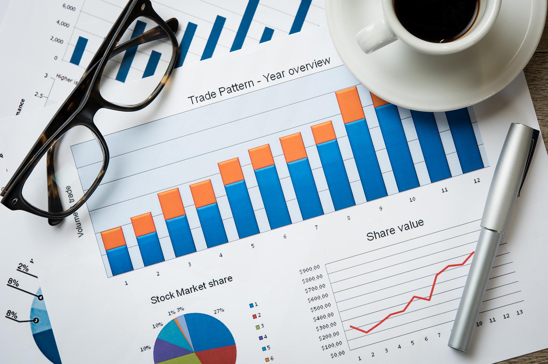 Close up of business document on office desk. Top view of business charts and graphs of stock market. Closeup of growing financial chart.